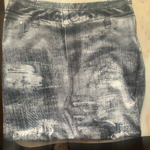I am selling a grey silky bodycon copycat Jean skirt!!